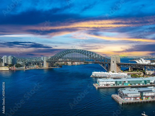 Sydney Harbour Australia with nice colours in the sky. Nice blue water of the Harbour, high rise offices and residential buildings of the City in the background, NSW Australia