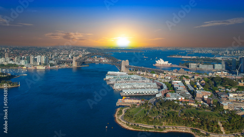 Sydney Harbour Australia with nice colours in the sky. Nice blue water of the Harbour, high rise offices and residential buildings of the City in the background, NSW Australia