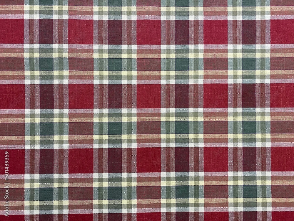 Colored checkered table cloth background. Texture of textile table napkin. Multicoloured gingham background. Colored checkered table cloth background. Texture of textile table napkin. Multicoloured gingham background.