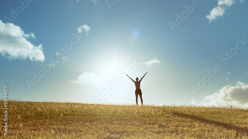 Happy young woman outdoors living in a healthy positive state of mind 