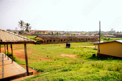 Wide view of a government school compound in Ghana. Rural area school