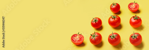 Fresh ripe tomatoes on yellow background with space for text