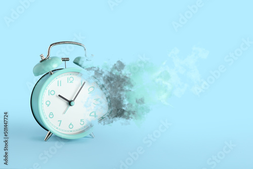 Crumbling alarm clock on bl...