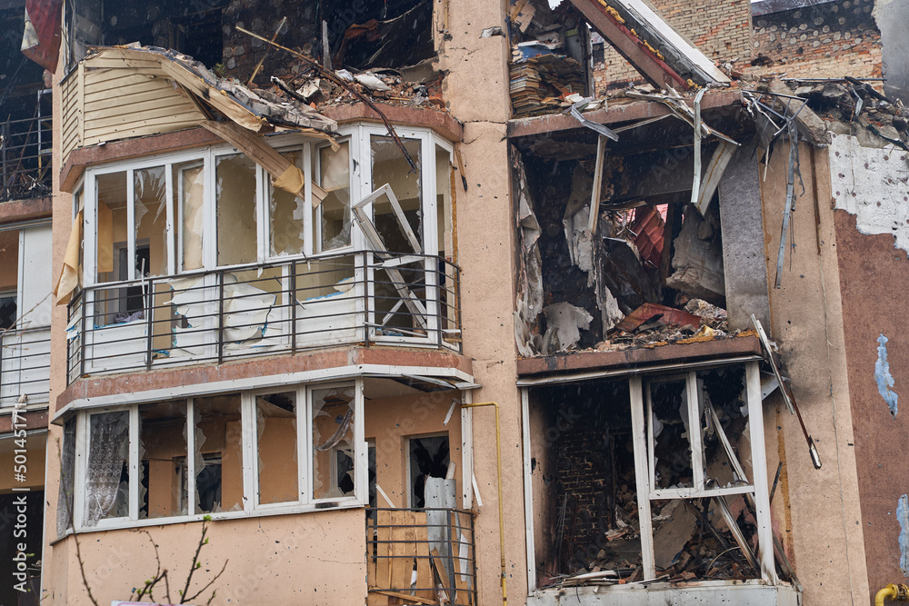 War of Russia against Ukraine. A residential building damaged by an enemy aircraft in the Ukrainian. Consequences of the war, damaged grocery market by the troops of the Russian army.