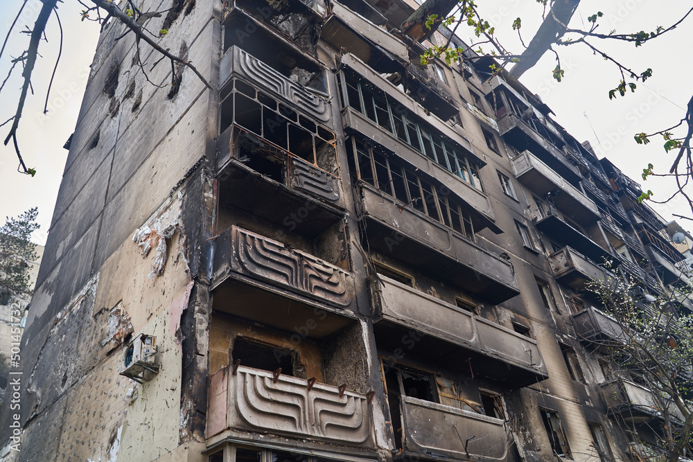 War of Russia against Ukraine. A residential building damaged by an enemy aircraft in the Ukrainian. Consequences of the war, damaged grocery market by the troops of the Russian army. War of Russia against Ukraine. A residential building damaged by an enemy aircraft in the Ukrainian. Consequences of the war, damaged grocery market by the troops of the Russian army.