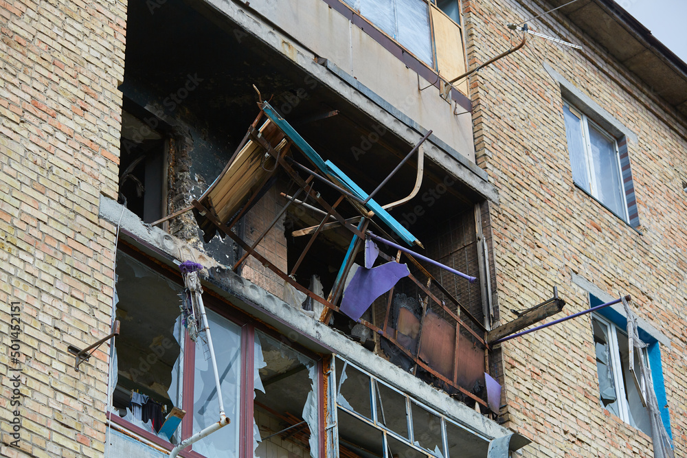 War of Russia against Ukraine. A residential building damaged by an enemy aircraft in the Ukrainian. Consequences of the war, damaged grocery market by the troops of the Russian army.