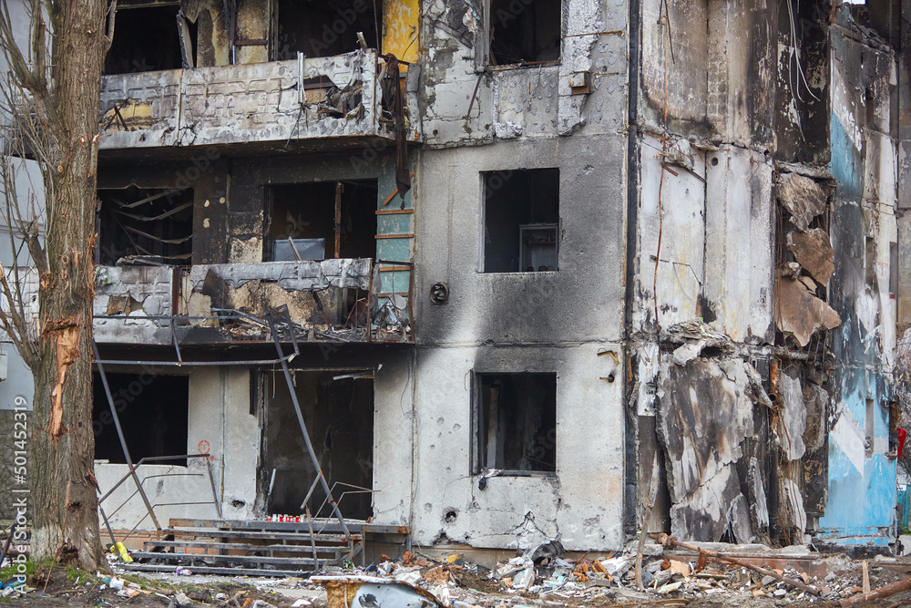 War of Russia against Ukraine. A residential building damaged by an enemy aircraft in the Ukrainian. Consequences of the war, damaged grocery market by the troops of the Russian army. War of Russia against Ukraine. A residential building damaged by an enemy aircraft in the Ukrainian. Consequences of the war, damaged grocery market by the troops of the Russian army.