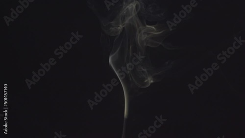 The steam smoke of on a black background. It is abstract.