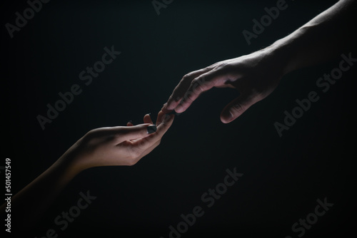 Hands at the time of rescue. Tenderness, tendet touch. Friends greeting, teamwork, friendship. Rescue, helping gesture or hands. Helping hand of a friend. Handshake, arms and friendship.