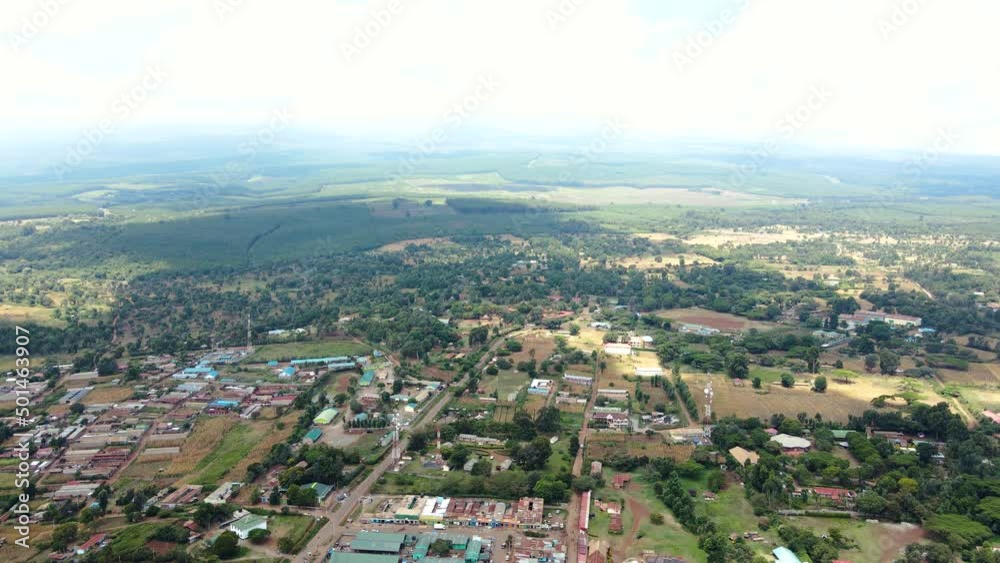 Aerial drone view Open Air market in the Loitokitok town, Kenya and mount Kilimanjaro- Rural village of Kenya. Rural settlement Kenya Aerial drone view Open Air market in the Loitokitok town, Kenya and mount Kilimanjaro- Rural village of Kenya. Rural settlement Kenya