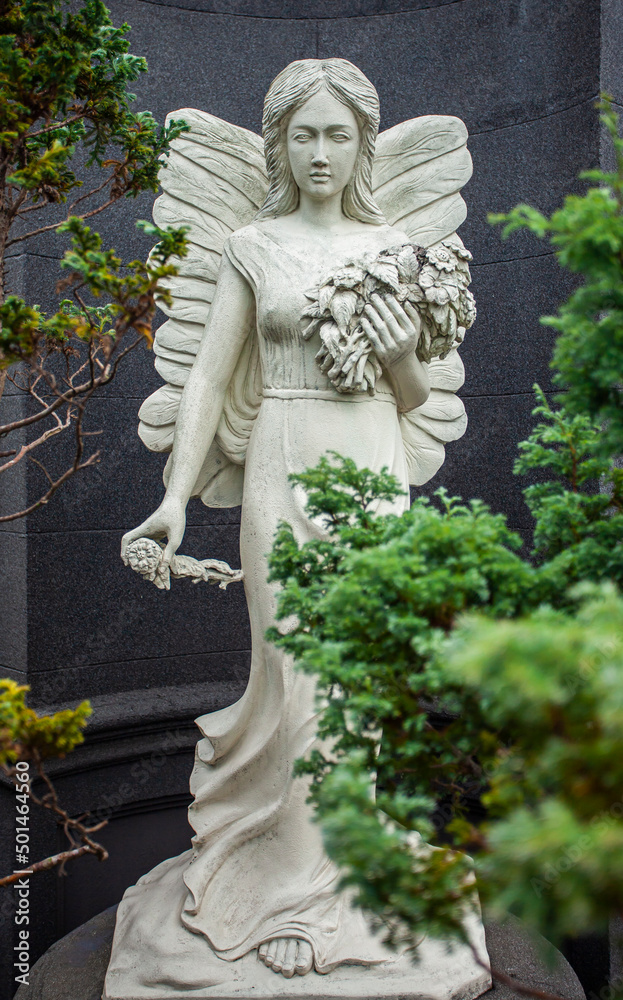 Very beautiful elegant female angel statue in roman style 