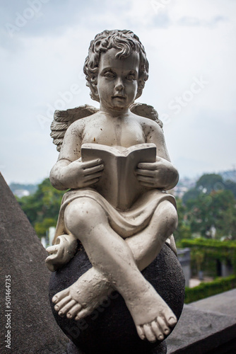 Very beautiful elegant angel children statue in roman style