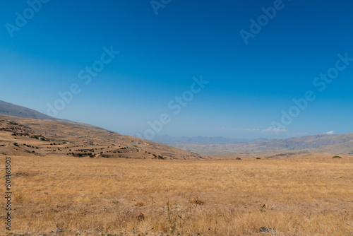 Picturesque Armenian autumn landscape in the backgrounds. Fields and meadows in the mountains of Armenia region. Stock photography