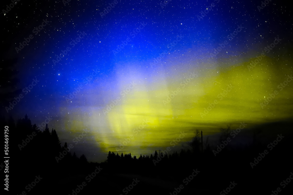 Aurora borealis colored in blue and yellow like the Ukrainian flag