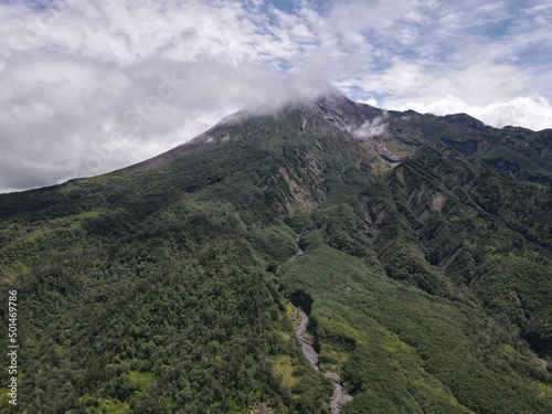 Aerial view of active Merapi mountain with clear sky in Indonesia