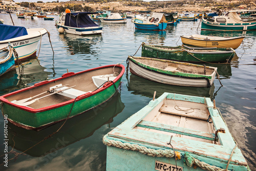 Colorful boats at Maltese fishing village Marsaxlokk, Malta © Natalia