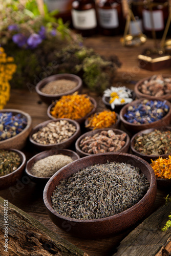 Natural medicine on wooden table background