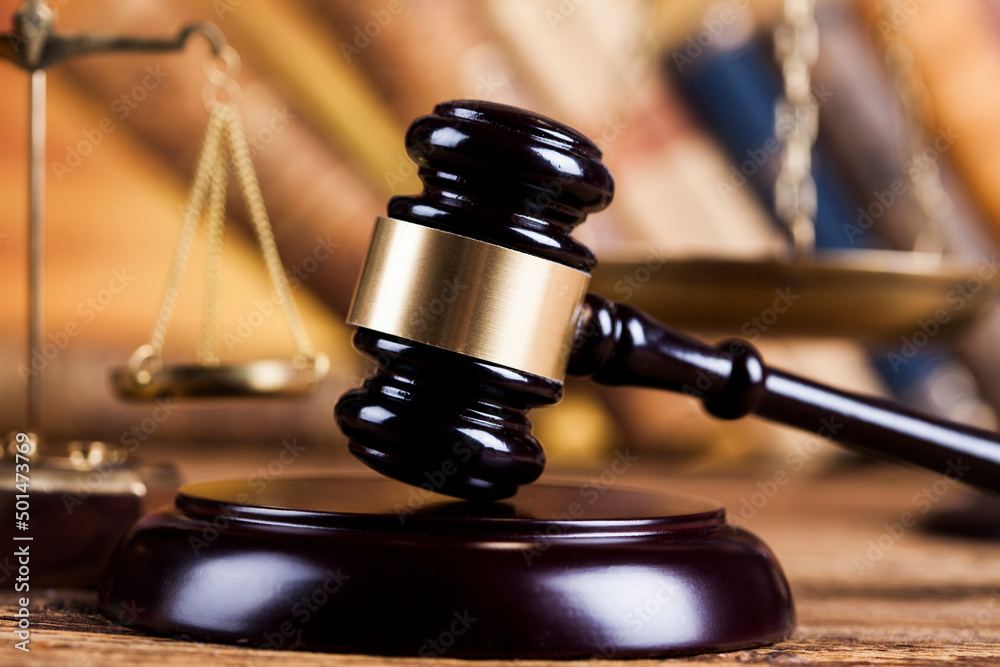 Judge gavel,Law concept, wooden desk background