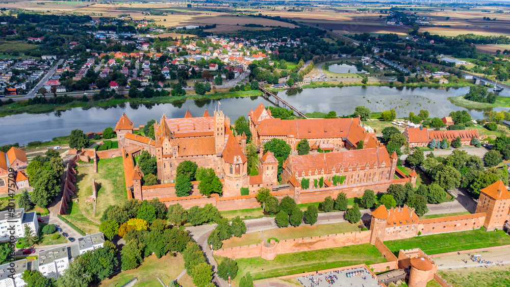 Aerial view on castle fortifications of the Teutonic Order in Malbork from East. Malbork Castle is the largest castle in the world measured by land area.