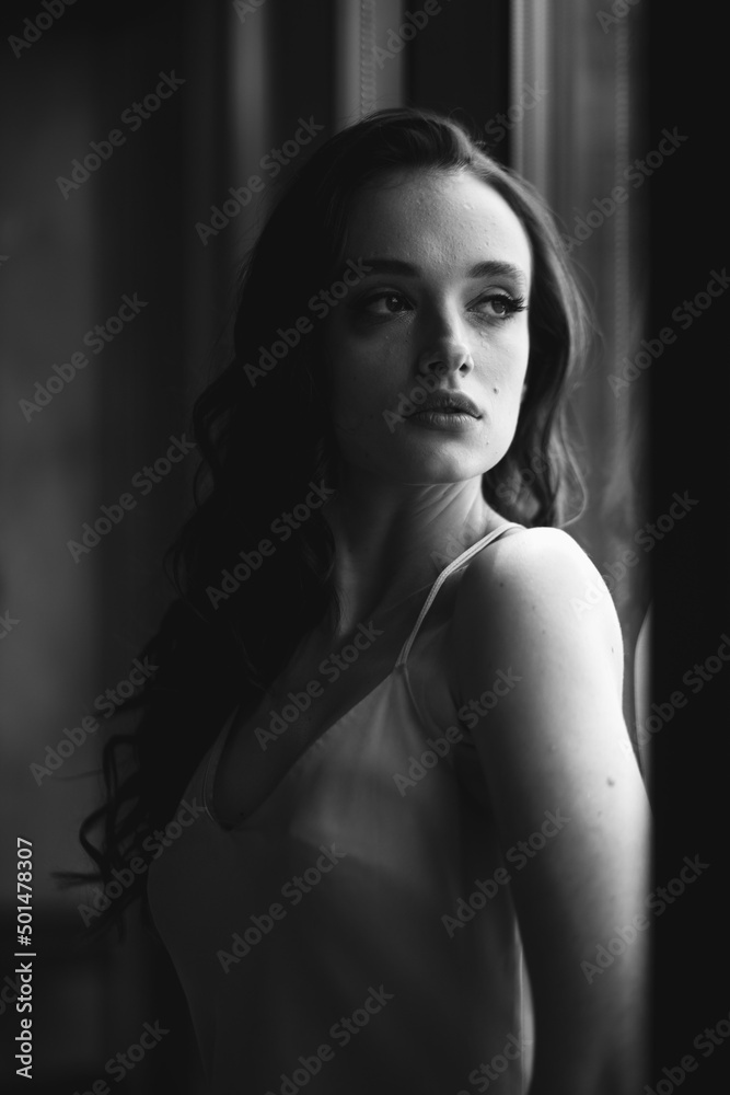 Attractive woman with a serious expression, well-groomed skin, lifestyle Attractive woman with a serious expression, well-groomed skin, lifestyle