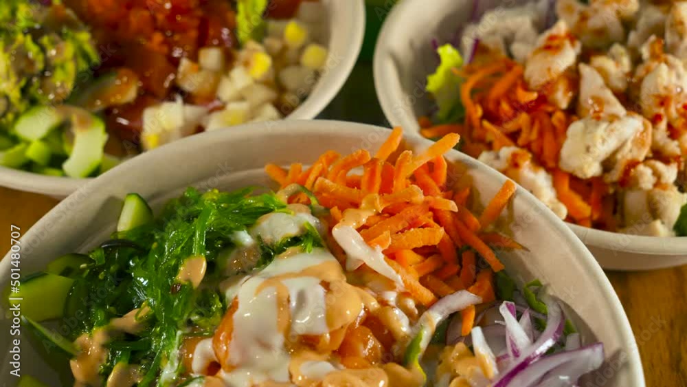 Poke bowls, a variety of traditional japanese sushi salad bowls, slider close up 4K Poke bowls, a variety of traditional japanese sushi salad bowls, slider close up 4K