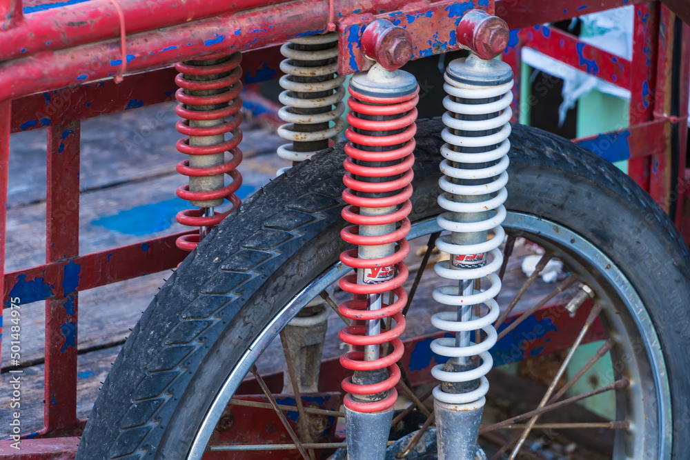 Bangkok, Thailand - April, 18, 2022 : Closeup of springs, shock absorbers motorcycle at Bangkok, Thailand.