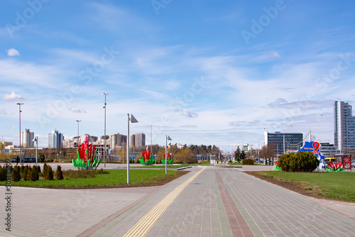 Minsk, Belarus-APRIL 26, 2022: State flags of the Republic of Belarus are waving in the wind on a flagpoles