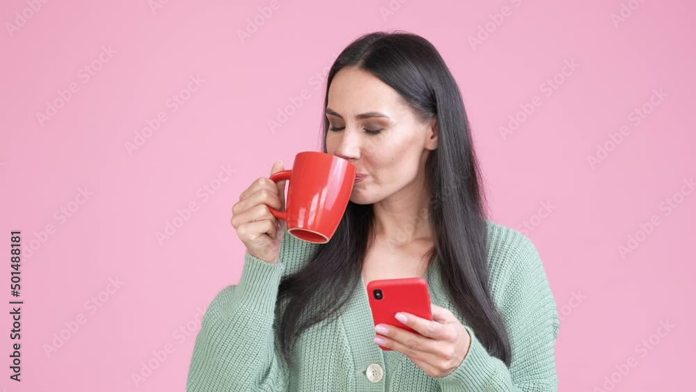 Cute lady use smart device chat drink latte isolated pastel color background Cute lady use smart device chat drink latte isolated pastel color background