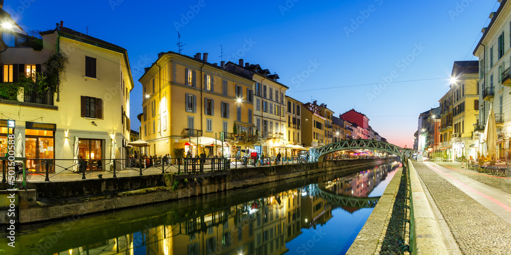 Milan Navigli Milano restaurant and bar district travel traveling holidays vacation town blue hour panorama in Italy