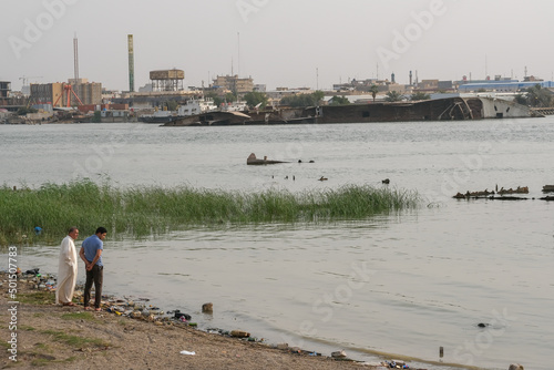 Basra, Iraq - April 15, 2022: landscape photo of the tour in river in basra city photo