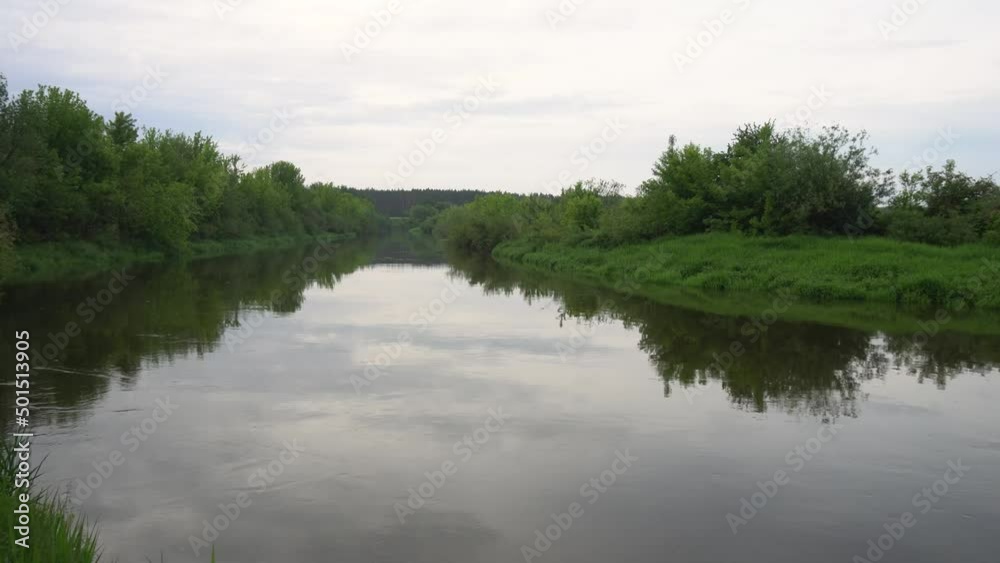 Sunrise on the river in the fog. Evening landscape with the last rays. Beautiful nature in summer. Sunrise on the river in the fog. Evening landscape with the last rays. Beautiful nature in summer.