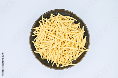 Εκτύπωση καμβά Top view of raw trofie pasta on a white background