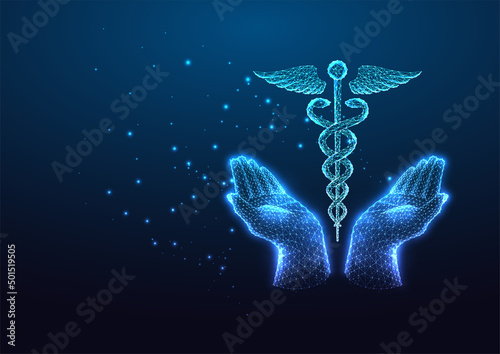 Futuristic health care concept with glow low polygonal hands holding caduceus symbol on dark blue 