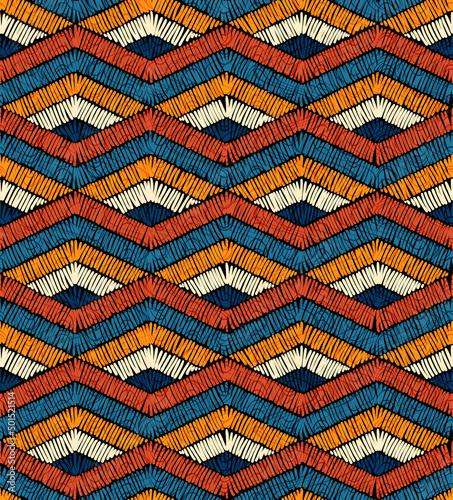 Embroidered seamless geometric pattern. Ornament for the carpet. Ethnic and tribal motifs. Colorful print of handmade. Vector illustration.