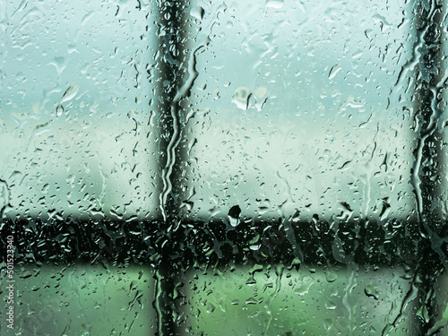 Natural water drops on glass window