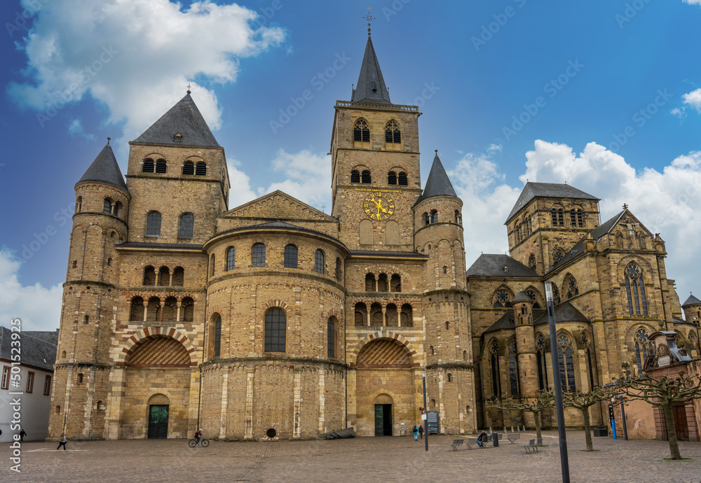 Trier, Germany - March 30 2022 - Tourist passing the Bischöfliches Generalvikariat Bistum (Episcopal General Vicariate Diocese)