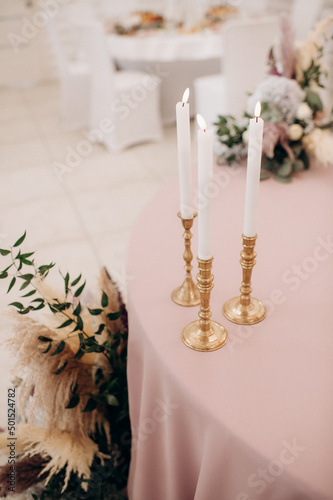 bohemian boho decor with candles on the wedding banquet table
