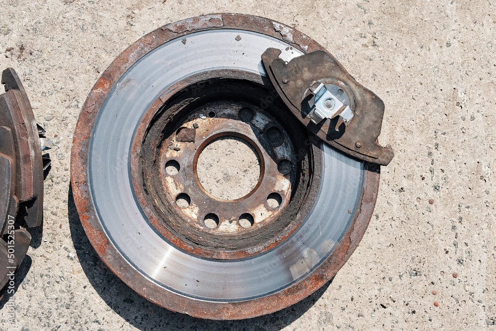 old used rusty car brake discs in bad condition