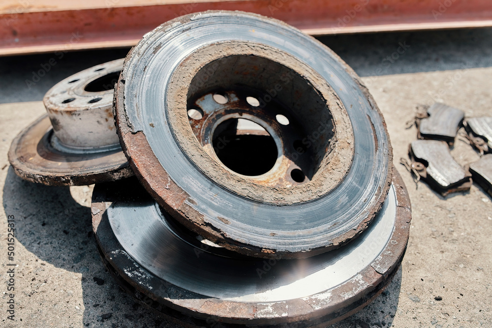 old used rusty car brake discs in bad condition old used rusty car brake discs in bad condition