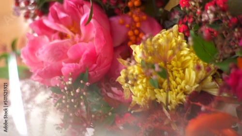 Wallpaper Mural Beautiful bouquet decorated with fresh rose, yellow and red flowers. Wedding decoration, women's collection concept. close-up, parallax. High quality FullHD footage Torontodigital.ca