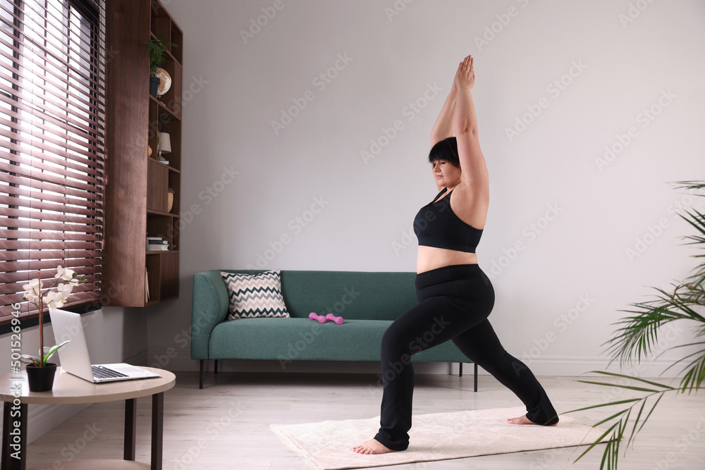 Overweight mature woman doing exercise at home, space for text Overweight mature woman doing exercise at home, space for text