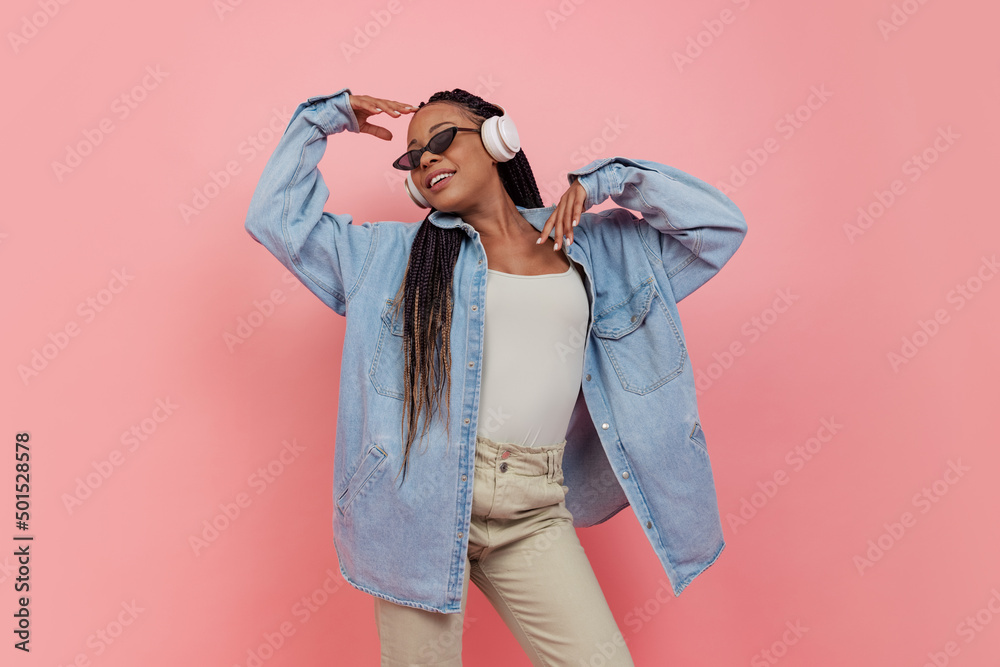 Fashionable portrait of female model in casual style outfit isolated on pink background. Concept of beauty, art, fashion, youth Fashionable portrait of female model in casual style outfit isolated on pink background. Concept of beauty, art, fashion, youth