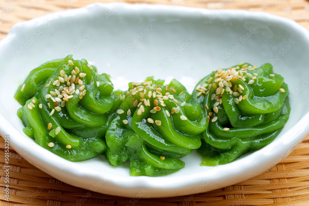 Sweet pandan pudding with white sesame seeds Sweet pandan pudding with white sesame seeds