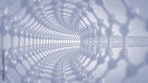 Animation of camera moving through carbon nanotube (CNT). Carbon nanotubes are cylindrical molecules made of rolled up graphene sheets photo