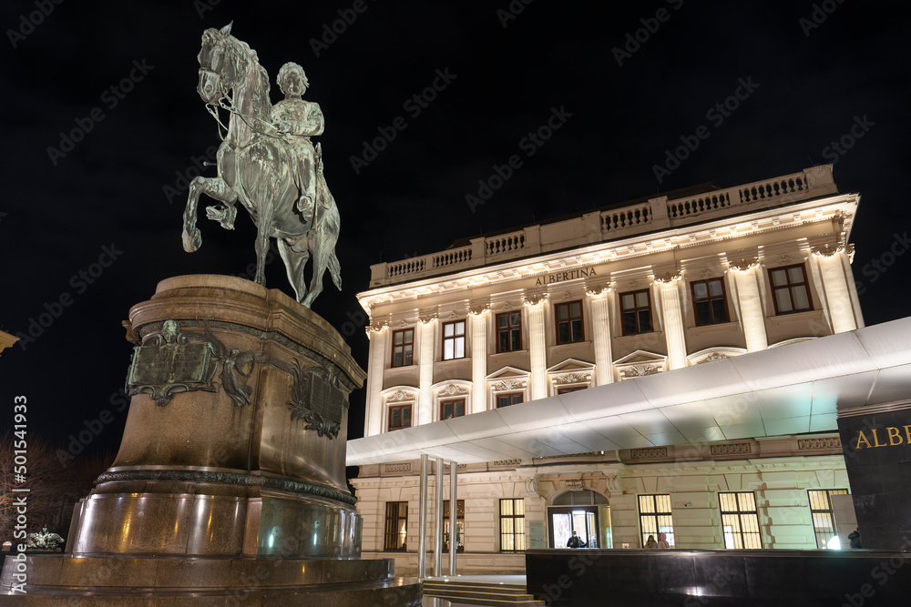 Evening view to Erzherzog Albrecht equestrian monument near famous Albertina museum palace in Vienna, Austria