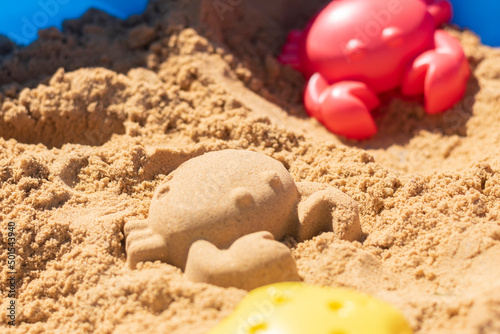 Plastic molds used by children to create different animals and shapes in the sand box