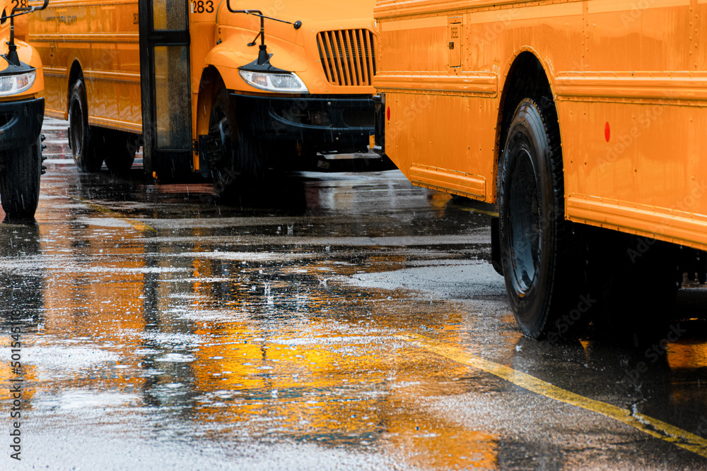 A heavy spring rain comes down in buckets in Windsor in Upstate NY. Reflection of the yellow
