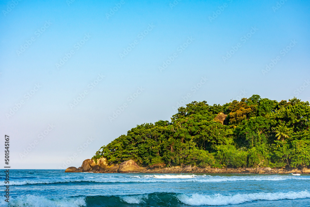 Peaceful and idyllic beach with the rainforest and the sea in Bertioga on the coast of the state of Sao Paulo, Brazil