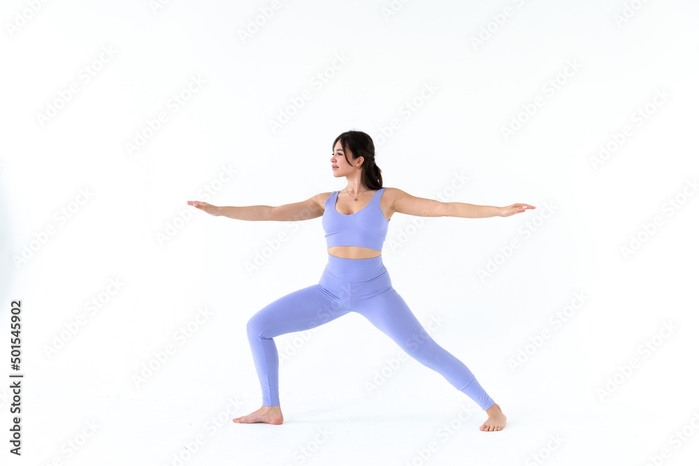 young woman practicing yoga on white background