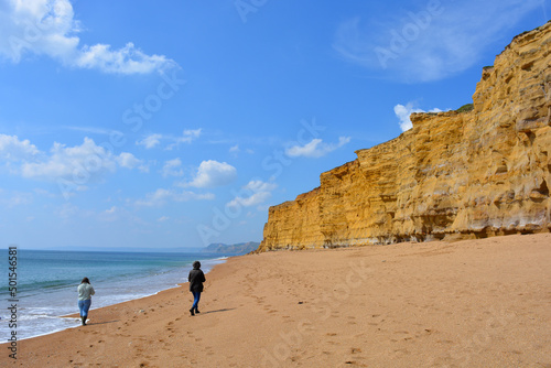 Fotografie Women on Hive Beach, Burton Bradstock